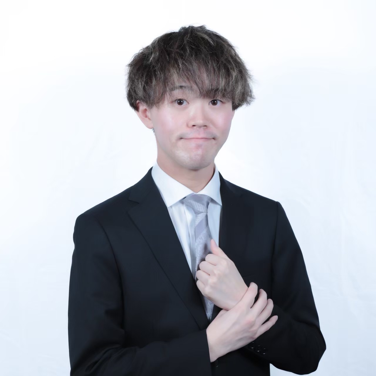 堤 俊由輝